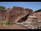 00873 ostia - regio ii - insula iv - terme di nettuno (ii,iv,2) - raum 16 - davorliegende zisterne - bli von osten - re - terme delle province - 06-2022.jpg